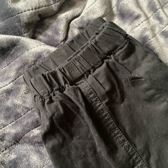 Black garage cargo pants with pockets and zipper double closed. Tighter cuffs. - Picture 3 of 6
